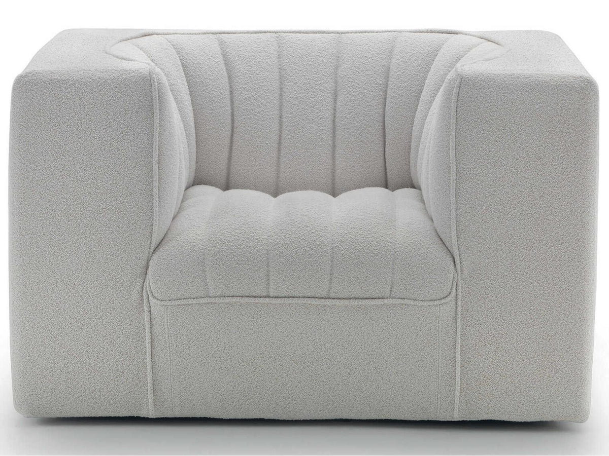 9000 Upholstered Accent Chair by Tito Agnoli in Fabric