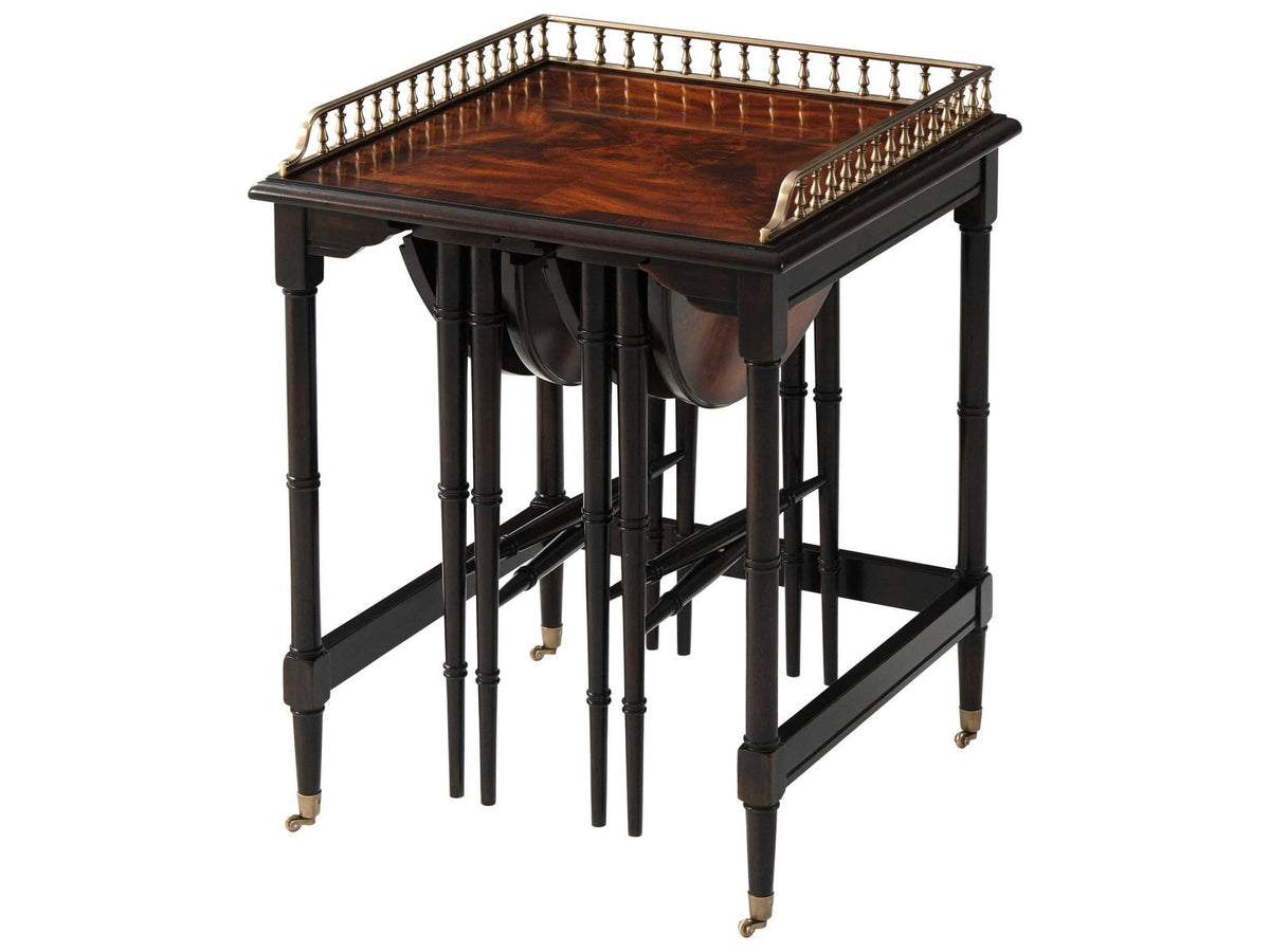 Ingenious Nest of Tables in Mahogany and Brass